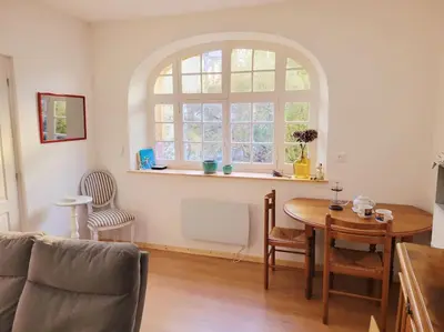 Coin salon dans l'établissement Maison de charme pour 4 personnes au calme