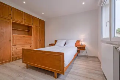 Un ou plusieurs lits dans un hébergement de l'établissement Maison proche Disney/Parking gratuit