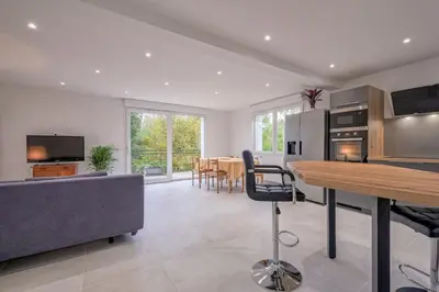 Cuisine ou kitchenette dans l'établissement Maison proche Disney/Parking gratuit