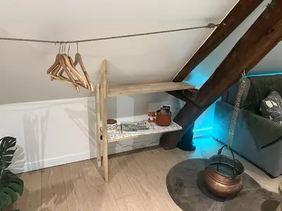 Un ou plusieurs lits dans un hébergement de l'établissement Appartement de Charme