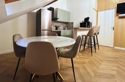Cuisine ou kitchenette dans l'établissement Pentagone 33 Stade de Reims