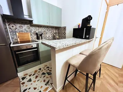 Cuisine ou kitchenette dans l'établissement Pentagone 33 Stade de Reims