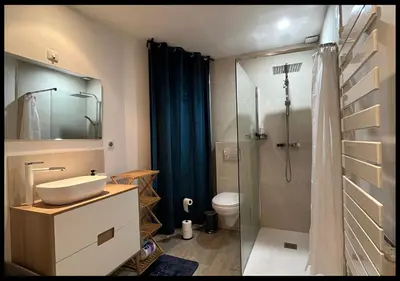 Salle de bains dans l'établissement Le Cocon