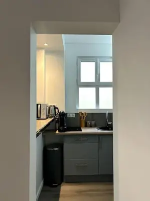 Cuisine ou kitchenette dans l'établissement Le petit Paris Compiegne