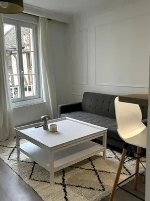 Coin salon dans l'établissement Le petit Paris Compiegne