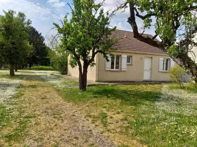 Jardin de l'établissement Charmante maison
