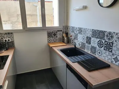 Cuisine ou kitchenette dans l'établissement Suite Forum Vue Imprenable