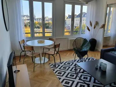 Coin salon dans l'établissement Suite Forum Vue Imprenable