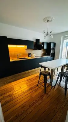 Cuisine ou kitchenette dans l'établissement Appartement neuf au centre d'Épernay.