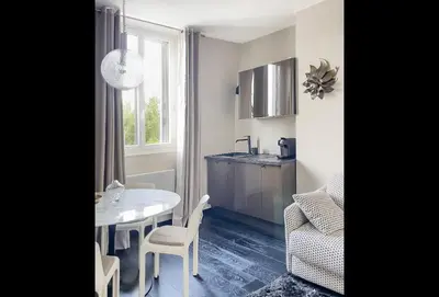Cuisine ou kitchenette dans l'établissement Les Alcoves - Studios design