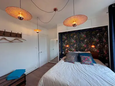 Un ou plusieurs lits dans un hébergement de l'établissement Appartement Bulles de Lumière