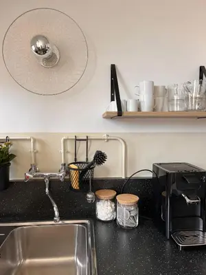 Cuisine ou kitchenette dans l'établissement Appartement Bulles de Lumière