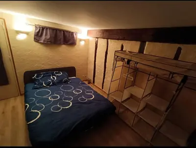Un ou plusieurs lits dans un hébergement de l'établissement Maison sur 3 étages, proche de Disneyland