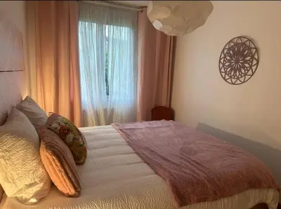 Un ou plusieurs lits dans un hébergement de l'établissement Charmante maison 10 mn Center Parcs Ailette