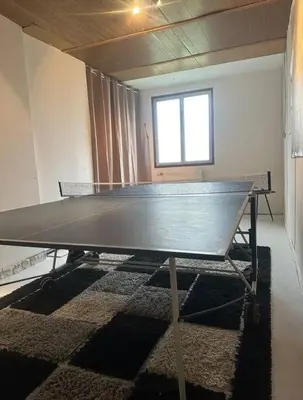 Tennis de table au sein de l'établissement Charmante maison 10 mn Center Parcs Ailette ou à proximité