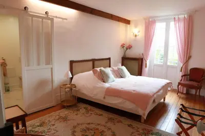 Un ou plusieurs lits dans un hébergement de l'établissement Le Manoir de Sainte-Aulde