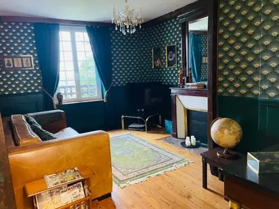 Coin salon dans l'établissement Le Manoir de Sainte-Aulde