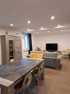 Télévision ou salle de divertissement dans l'établissement Gîte des deux L