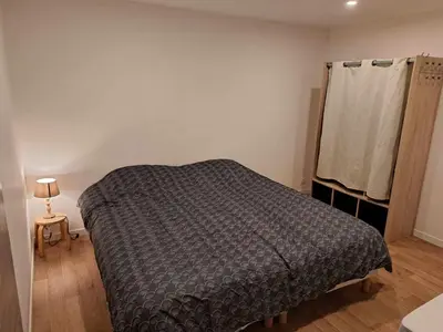 Un ou plusieurs lits dans un hébergement de l'établissement Gîte des deux L