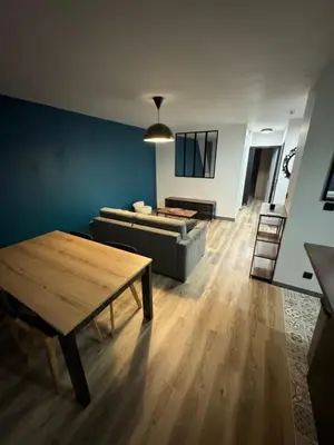 Coin salon dans l'établissement Appartement Cosy dans le coeur de Witry-les-Reims