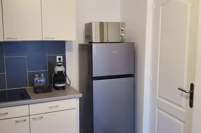 Cuisine ou kitchenette dans l'établissement Tulsa Home - Appartement 1 chambre Cosy et calme