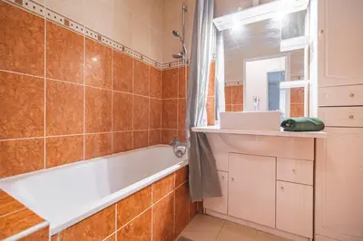 Salle de bains dans l'établissement Joli appartement Le Chalet + parking