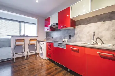 Cuisine ou kitchenette dans l'établissement Joli appartement Le Chalet + parking
