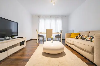 Télévision ou salle de divertissement dans l'établissement Joli appartement Le Chalet + parking