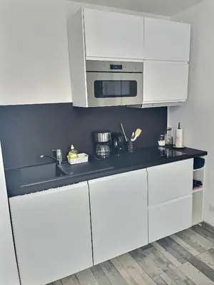 Cuisine ou kitchenette dans l'établissement Le Jard