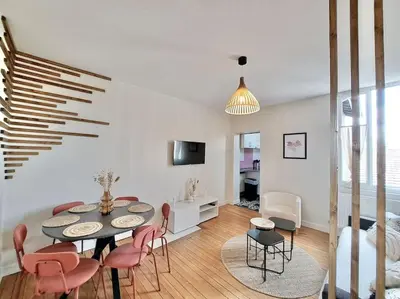 Télévision ou salle de divertissement dans l'établissement Appartement Cosy