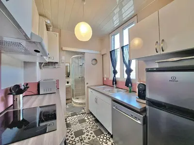 Cuisine ou kitchenette dans l'établissement Appartement Cosy