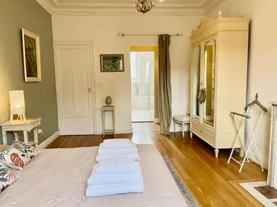 Un ou plusieurs lits dans un hébergement de l'établissement L’Hôtel Particulier des Anges