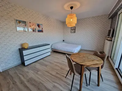 Un ou plusieurs lits dans un hébergement de l'établissement Studio avenue de Champagne