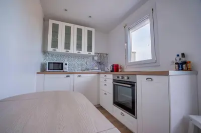 Cuisine ou kitchenette dans l'établissement Le Clovis - Cathédrale