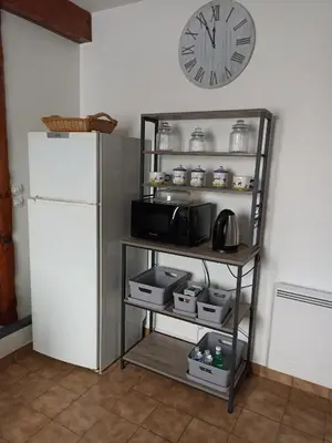 Cuisine ou kitchenette dans l'établissement La BenO'Bene