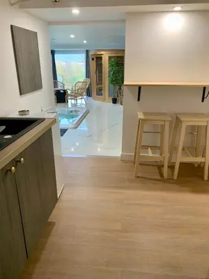 Cuisine ou kitchenette dans l'établissement Superbe appartement avec spa privatif
