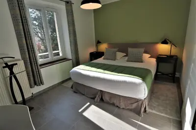 Un ou plusieurs lits dans un hébergement de l'établissement Manoir de Montigny