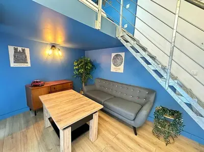 Coin salon dans l'établissement Landouzy maison centre ville
