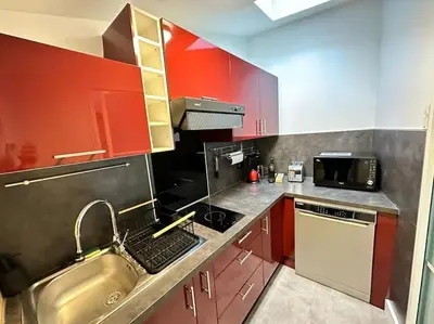 Cuisine ou kitchenette dans l'établissement Landouzy maison centre ville