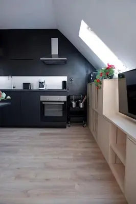 Cuisine ou kitchenette dans l'établissement E centre ville professeur langevin spacieux cosy