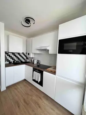 Cuisine ou kitchenette dans l'établissement Le petit cocon de Kintana -Disney-Parking