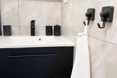 Salle de bains dans l'établissement Le petit cocon de Kintana -Disney-Parking