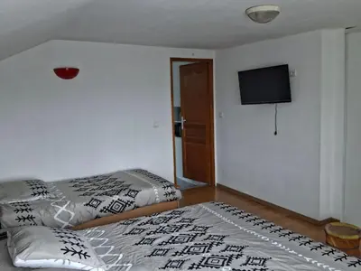 Un ou plusieurs lits dans un hébergement de l'établissement appartement 3 personnes