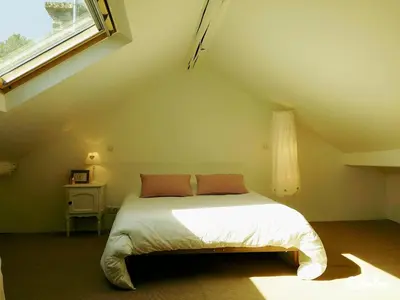 Un ou plusieurs lits dans un hébergement de l'établissement Les Appartements de Champagne