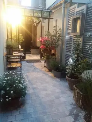 Jardin de l'établissement Les Appartements de Champagne