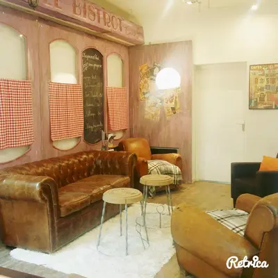 Coin salon dans l'établissement Les Appartements de Champagne