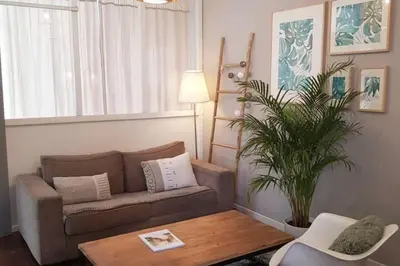 Coin salon dans l'établissement Les Appartements de Champagne