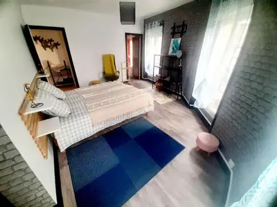 Un ou plusieurs lits dans un hébergement de l'établissement Maison de ville au centre de Fismes