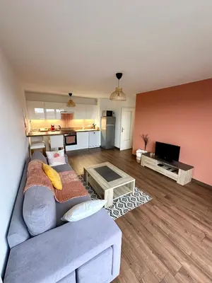 Cuisine ou kitchenette dans l'établissement Appartement chaleureux - Meaux