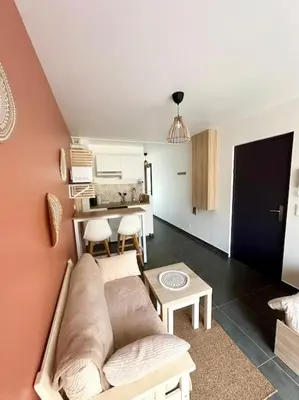 Cuisine ou kitchenette dans l'établissement Studio chaleureux centre-ville